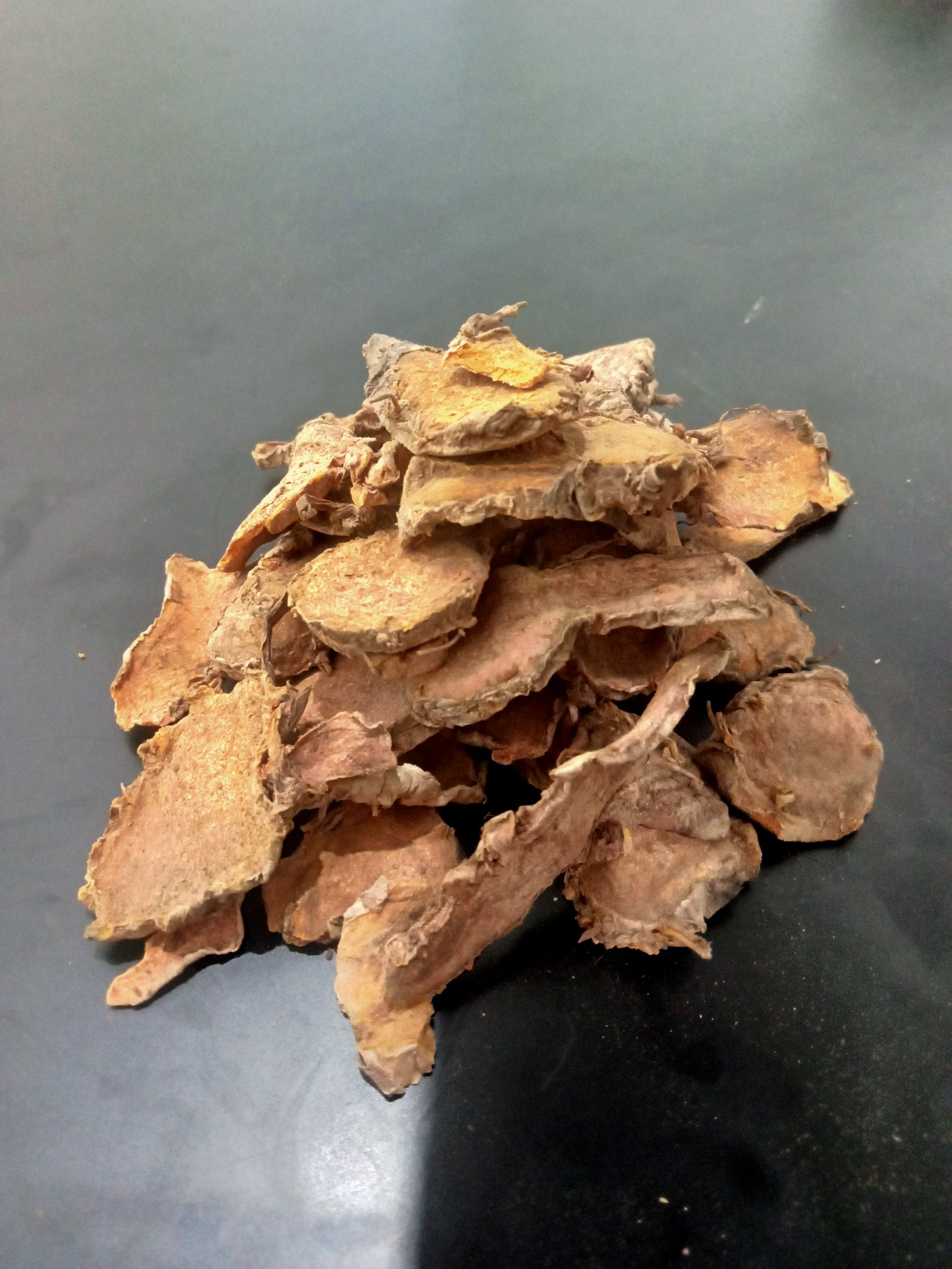 Slice dried turmeric